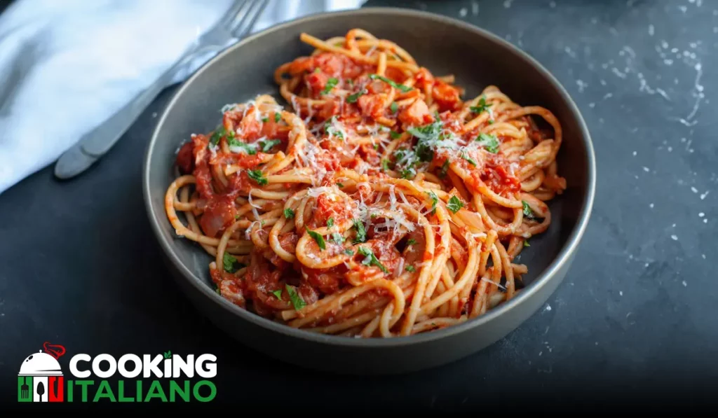 Explore the classic Bucatini all'Amatriciana recipe, a traditional Italian pasta dish with tomato, pancetta, and pecorino cheese. Try it now!
