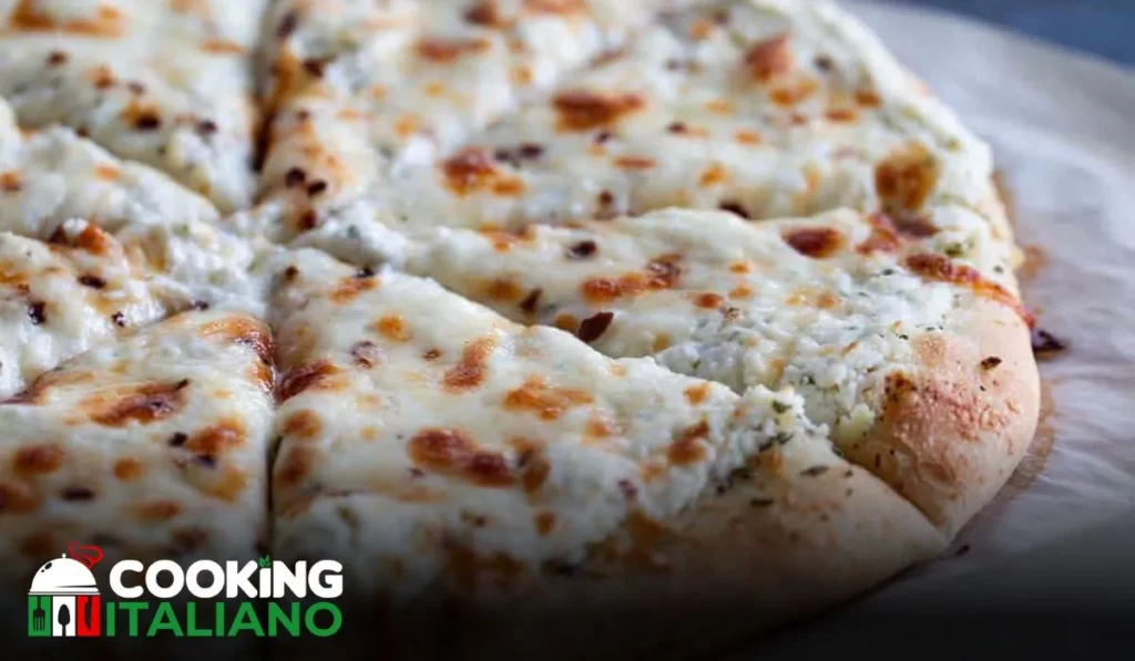 Elevate your pizza experience with our delectable White Pizza recipe. A perfect blend of creamy cheeses and savory toppings for a taste sensation like no other.