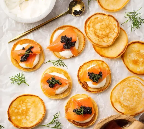 Elevate your appetizer game with our luxurious blinis with caviar making recipe. A culinary indulgence you won't soon forget.