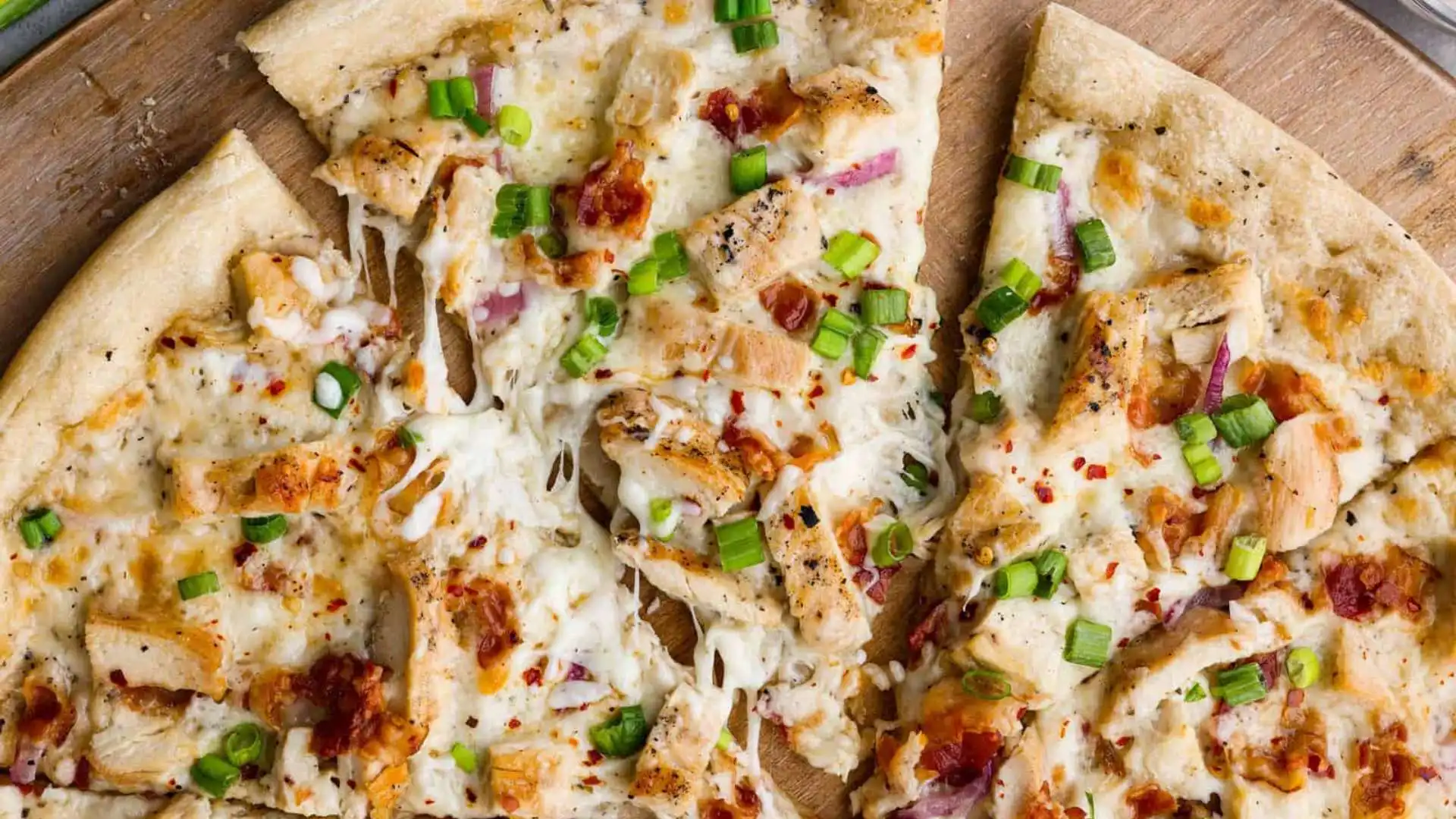 Transform your pizza night with our Chicken Alfredo Pizza recipe. A heavenly blend of creamy Alfredo sauce and savory chicken, creating a slice of pure indulgence.