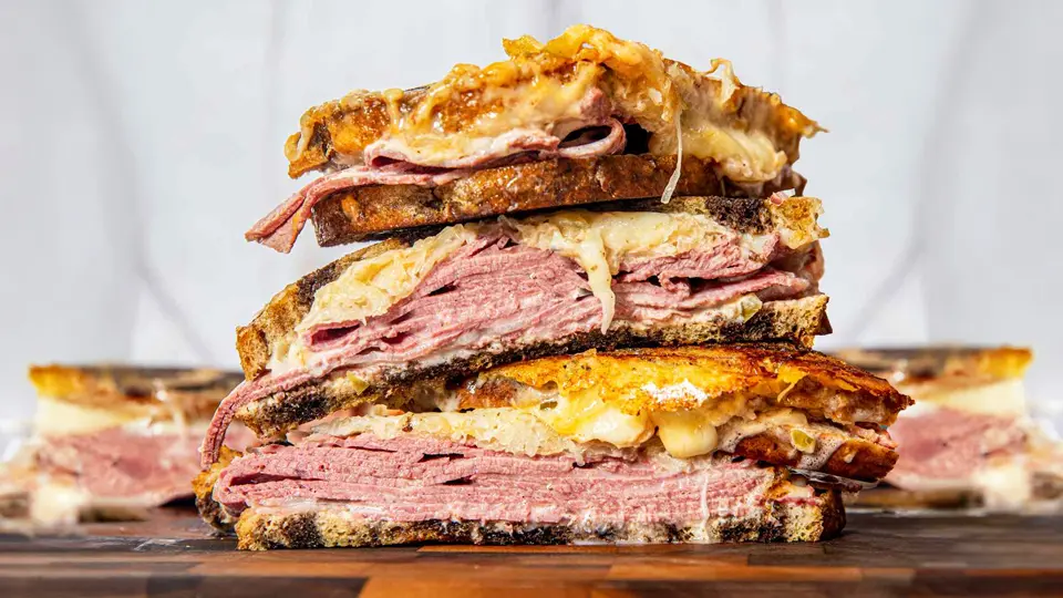 Elevate your lunchtime routine with a delicious classic Reuben sandwich. With its perfectly grilled bread and layers of savory ingredients, it's the ultimate comfort food for sandwich enthusiasts.