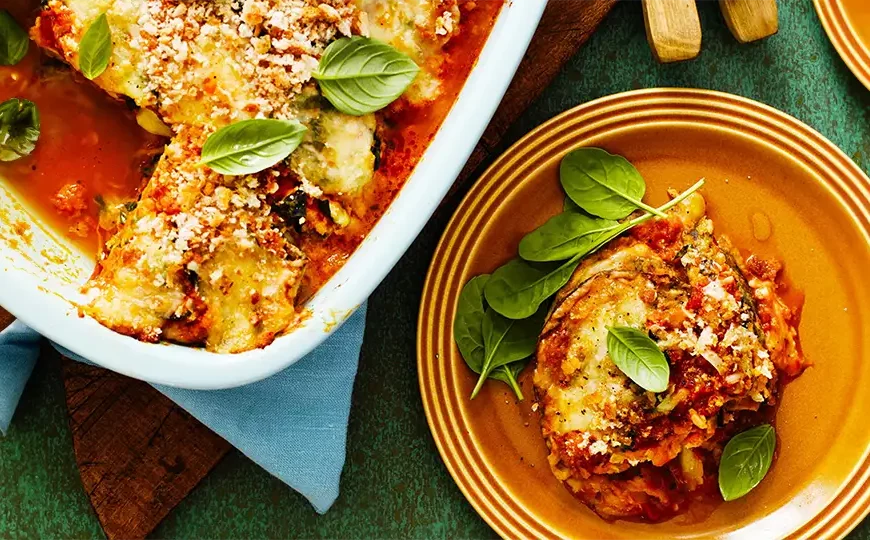 Delight your taste buds with our Eggplant Parmigiana recipe. Layers of tender eggplant, tangy marinara sauce, and melted cheese, baked to perfection for a satisfying Italian classic.