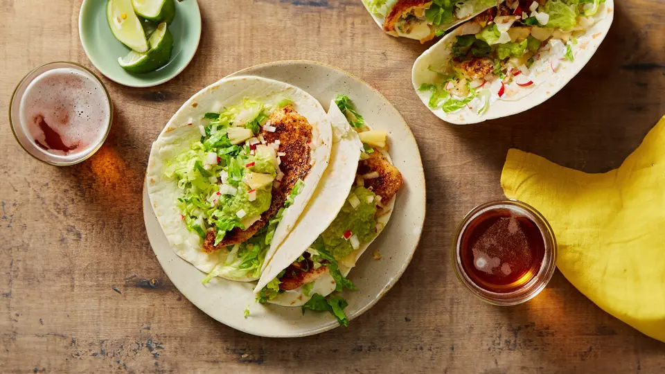 Transport your taste buds to the tropics with our flavorful fish tacos featuring pineapple salsa and avocado crema. The combination of flaky fish, sweet pineapple, and creamy avocado is a culinary adventure you won't want to miss.