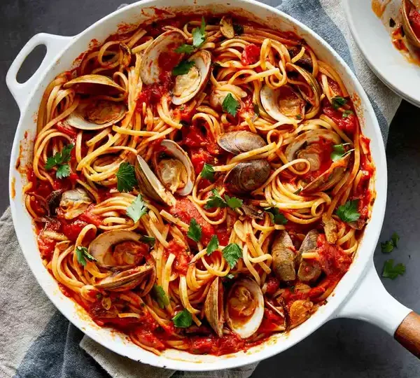 Dive into the flavors of the sea with our Linguine with Red Clam Sauce recipe. A tantalizing blend of tender linguine pasta and savory clam sauce, perfect for seafood lovers.