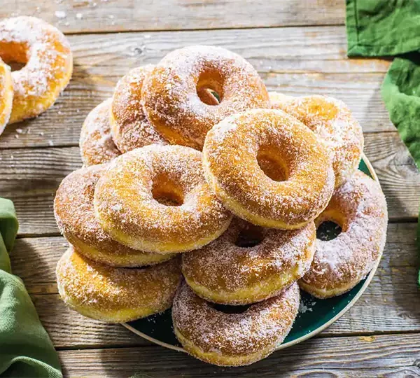 Treat yourself to the irresistible sweetness of Neapolitan Style Graffe Doughnuts. A delectable Italian delicacy, perfect for satisfying your dessert cravings.