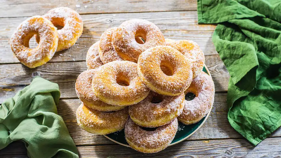 Treat yourself to the irresistible sweetness of Neapolitan Style Graffe Doughnuts. A delectable Italian delicacy, perfect for satisfying your dessert cravings.