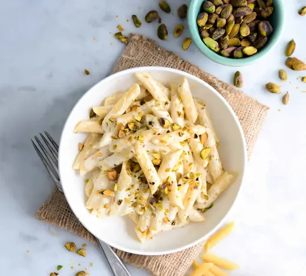 Elevate your pasta game with vibrant green Pistachio Pesto for an unforgettable meal