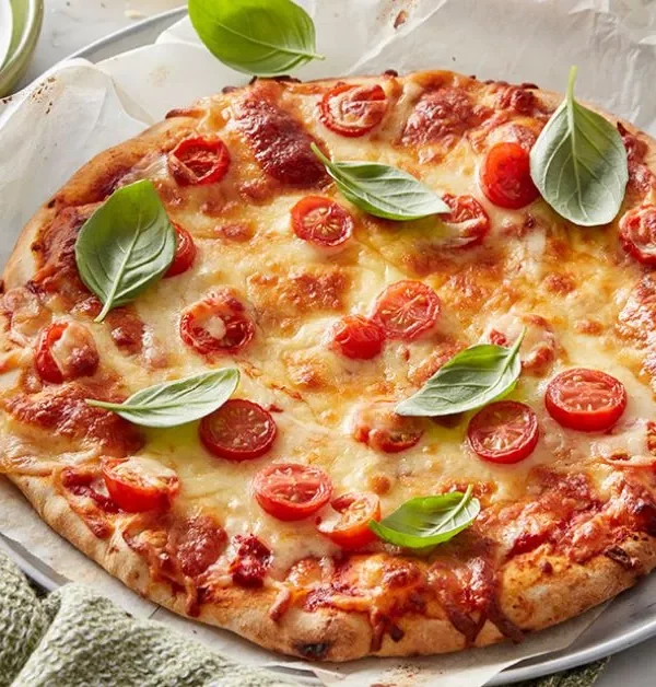 Taste the classic charm of Pizza Margherita! Simple, yet sublime - experience the essence of Italy in every slice.