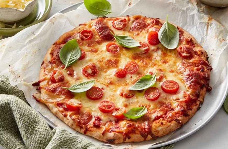 Taste the classic charm of Pizza Margherita! Simple, yet sublime - experience the essence of Italy in every slice.