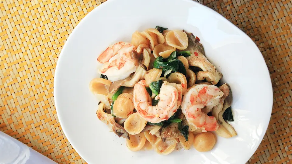 Fresh shrimp bathed in a garlicky, white wine sauce with capers and olives - Shrimp Monachina is a flavor explosion!