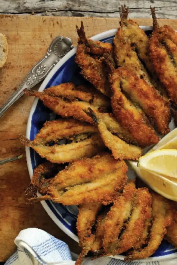 Experience the crispy perfection of Breaded and Deep Fried Anchovies. A savory delight that's irresistibly crunchy on the outside and tender on the inside.